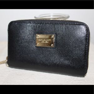 Michael Kors cellphone wristlet/ wallet
